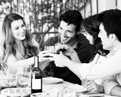 Group Of Friends Toasting Wine Glass